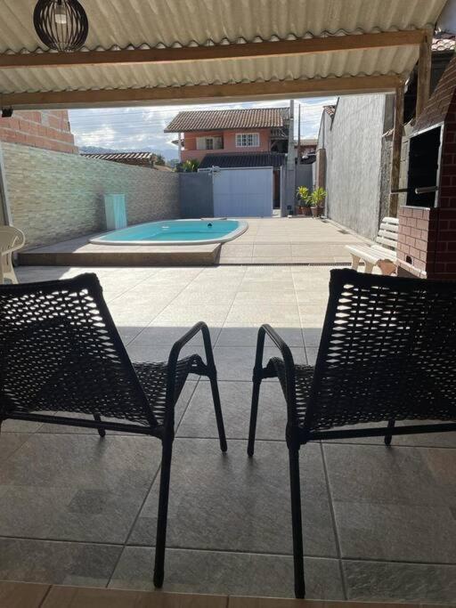 Holiday home 5min Da Praia Grande, Piscina, Wi-fi, Churrasqueira, Cozinha Externa